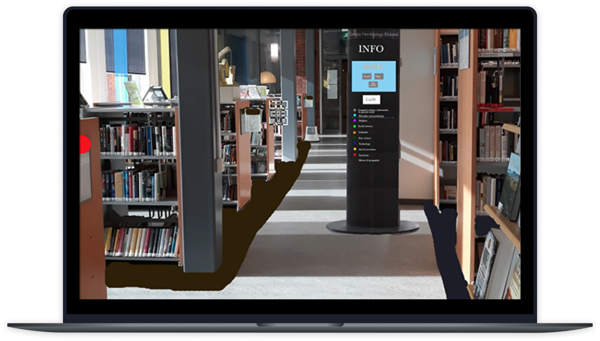 Colour-coded shelf sections deployed in the library